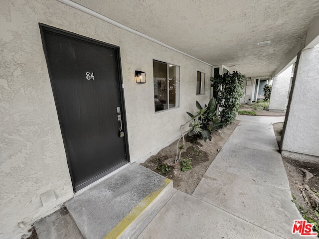 entrance to property with covered porch