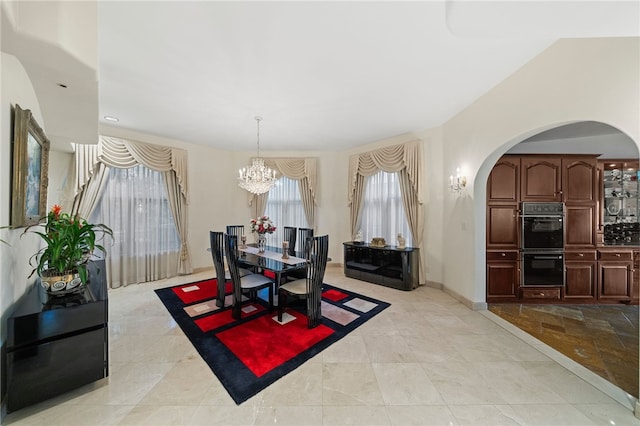 dining area with a notable chandelier