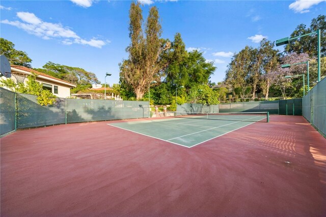 view of tennis court with basketball court