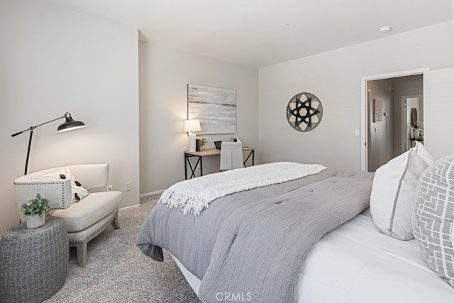 bedroom with light colored carpet