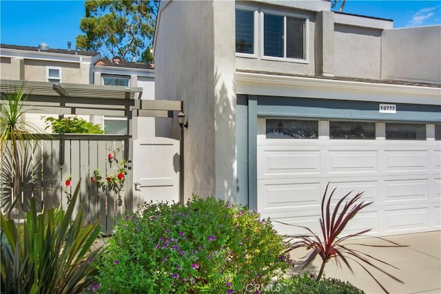 view of side of property featuring a garage