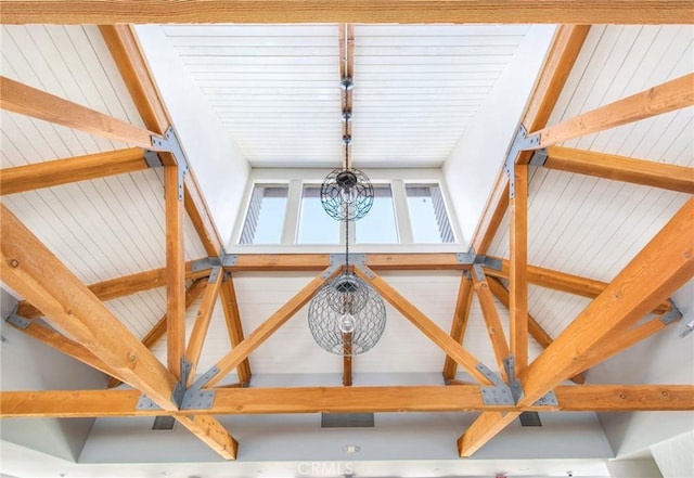 room details featuring track lighting and a notable chandelier