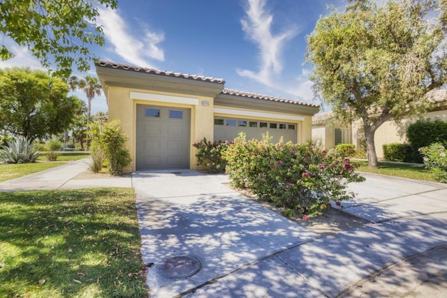 mediterranean / spanish-style home featuring a garage