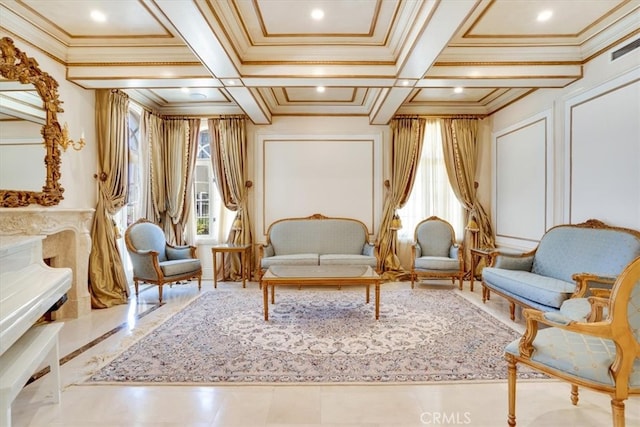 sitting room featuring beamed ceiling, coffered ceiling, a fireplace, and crown molding