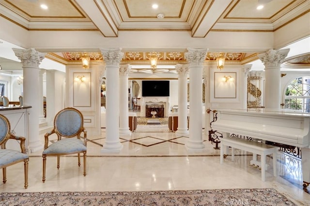 interior space with coffered ceiling, ornamental molding, beam ceiling, and ornate columns