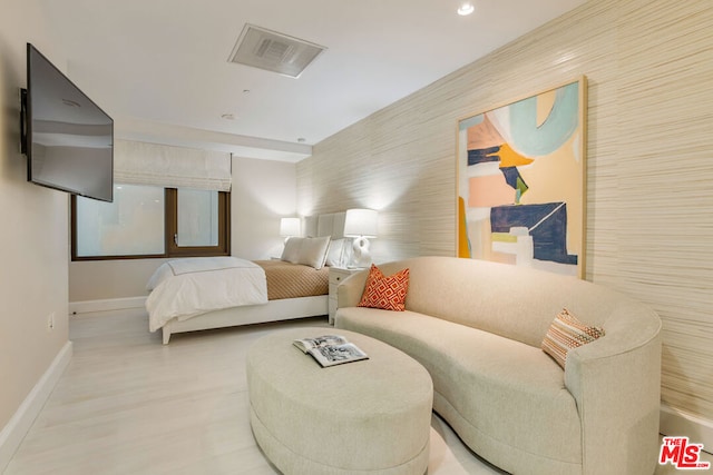 bedroom featuring wood-type flooring