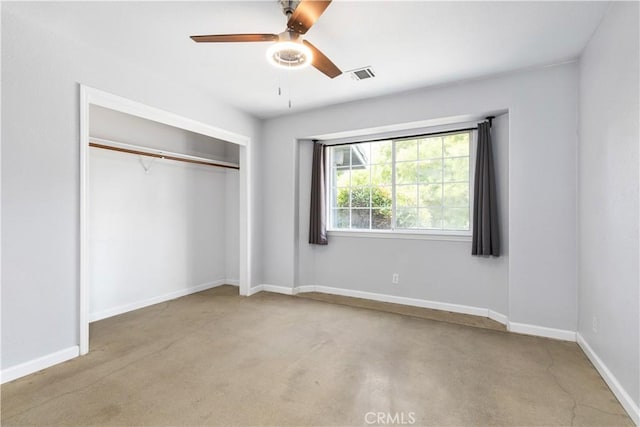 unfurnished bedroom with light carpet, ceiling fan, and a closet