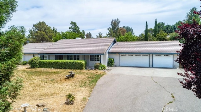 ranch-style home with a garage