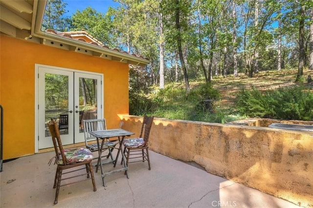 view of patio featuring french doors