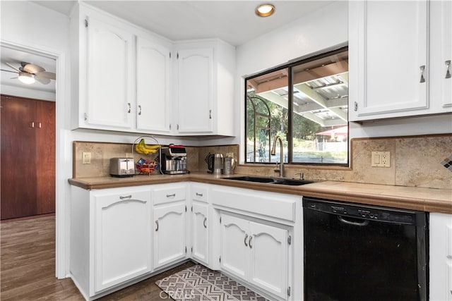 kitchen with dark hardwood / wood-style flooring, dishwasher, ceiling fan, white cabinetry, and sink