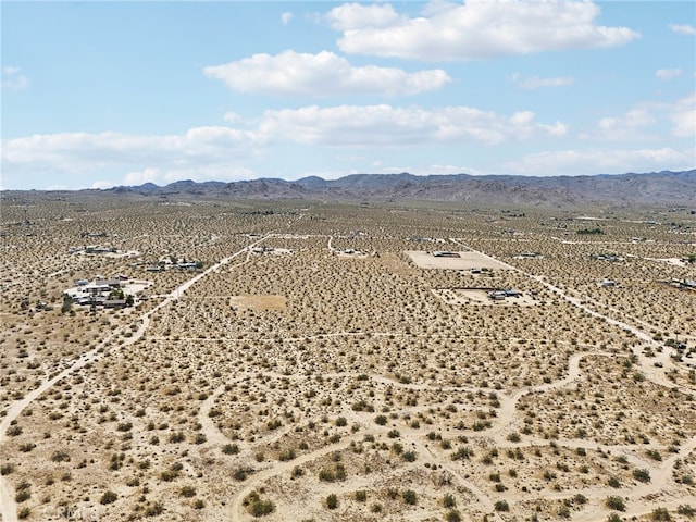 drone / aerial view featuring a mountain view