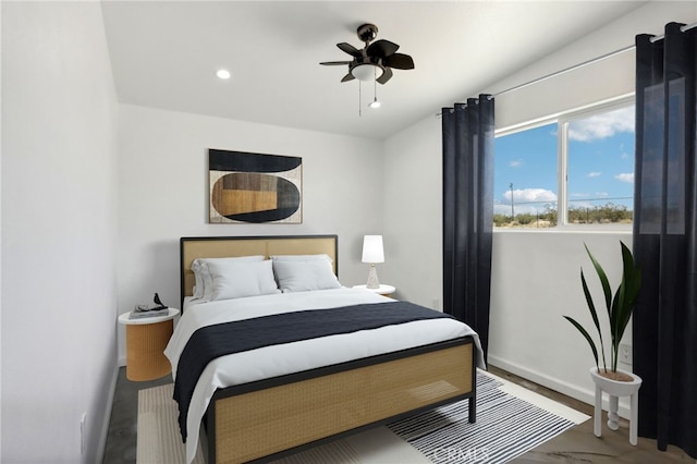 bedroom featuring wood-type flooring and ceiling fan