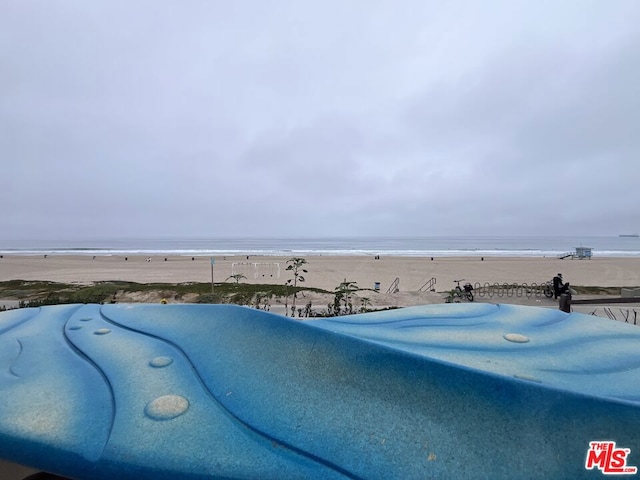 exterior details featuring a beach view