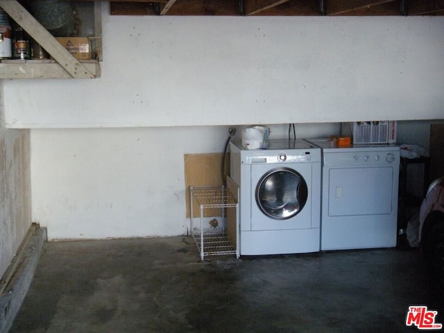 laundry room with independent washer and dryer