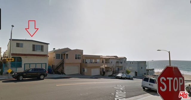 view of street featuring a water view