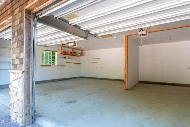 garage featuring a garage door opener