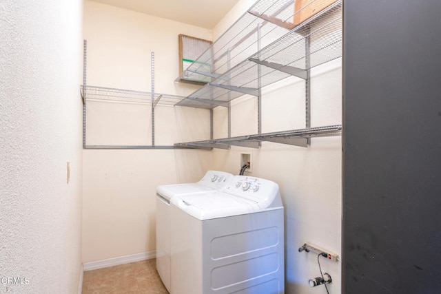 bathroom with walk in shower, vanity, tile patterned flooring, and toilet