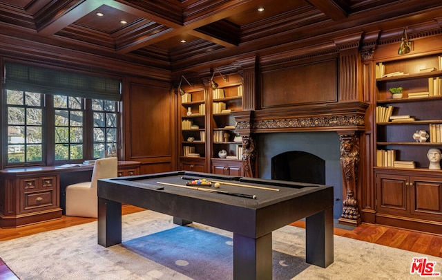 playroom with beamed ceiling, built in features, wood-type flooring, billiards, and crown molding