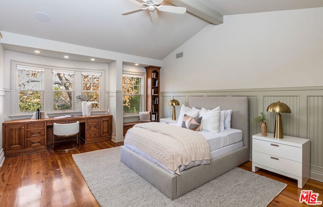 bedroom featuring vaulted ceiling with beams, ceiling fan, and dark wood-type flooring