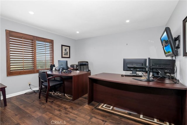 office space with dark hardwood / wood-style flooring