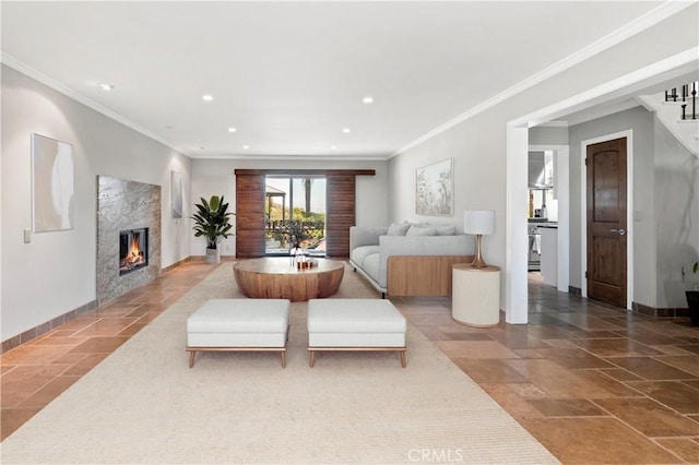 living room with crown molding and a high end fireplace