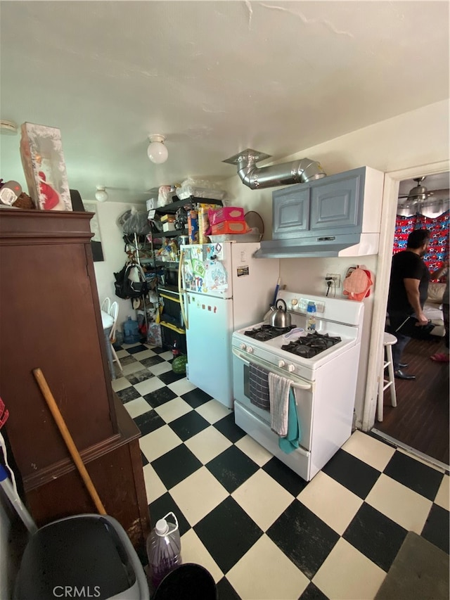 kitchen featuring gray cabinets and white appliances