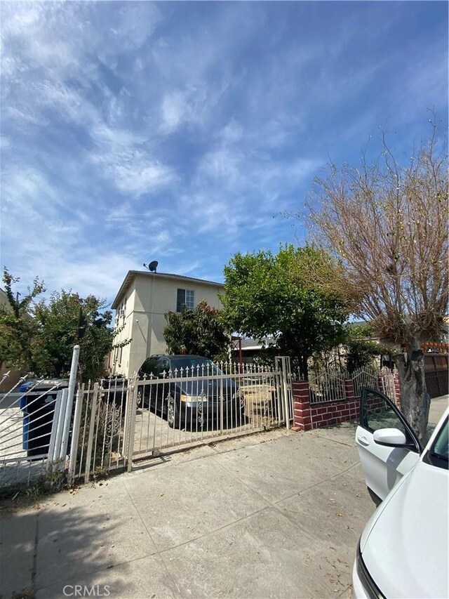 1348 E 21st St, Los Angeles, CA 90011 - view of front of home with a gate and a fenced front yard