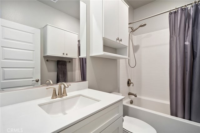 full bathroom with vanity, shower / bath combination with curtain, and toilet