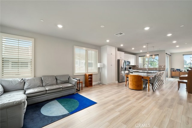 living room featuring light hardwood / wood-style floors