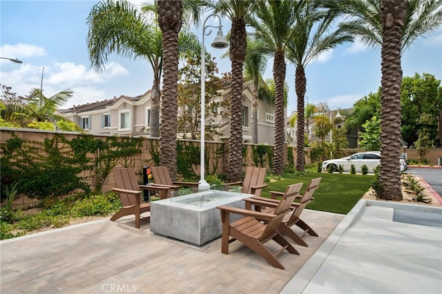 view of patio featuring an outdoor fire pit