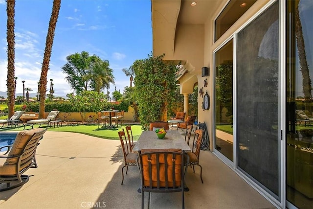 view of patio with outdoor dining area