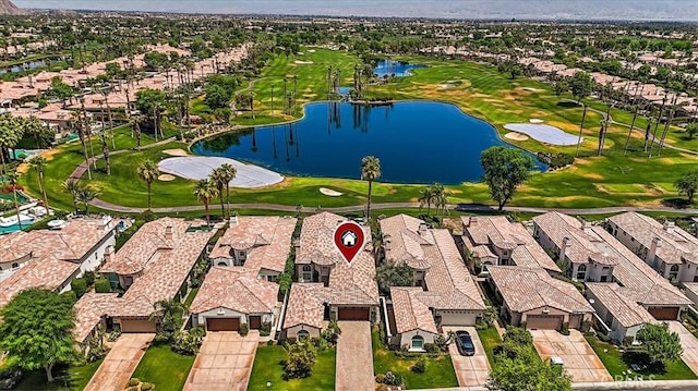 bird's eye view with golf course view, a residential view, and a water view