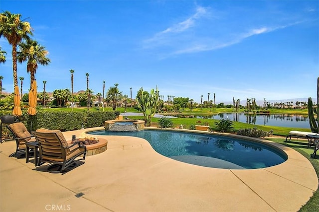 view of swimming pool featuring a patio, a water view, and a pool with connected hot tub