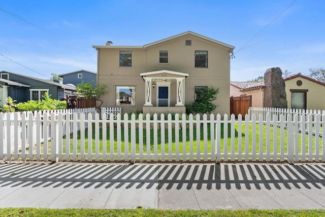 view of front of house with a front yard