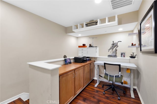 office with dark wood-style floors, baseboards, and visible vents