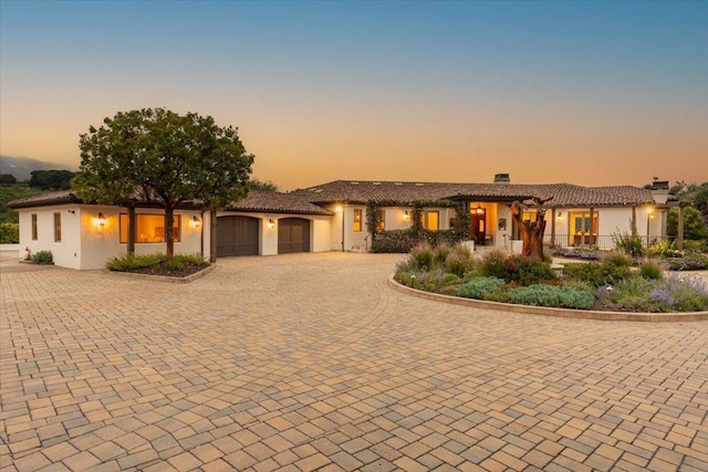 view of front of home with a garage