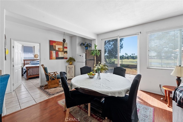 dining room featuring light hardwood / wood-style floors