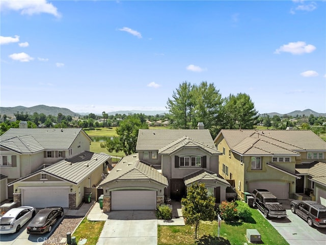 view of front of house with a mountain view