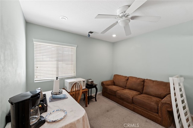 office with ceiling fan and light colored carpet