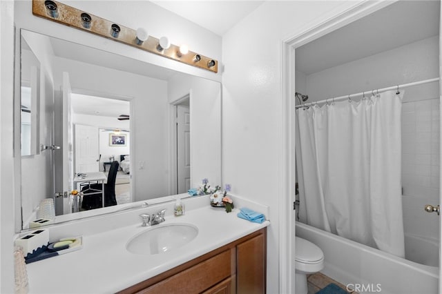 full bathroom with vanity, toilet, and shower / bath combo