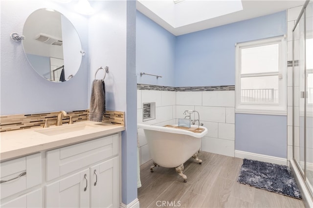 bathroom featuring vanity, hardwood / wood-style flooring, tile walls, and separate shower and tub