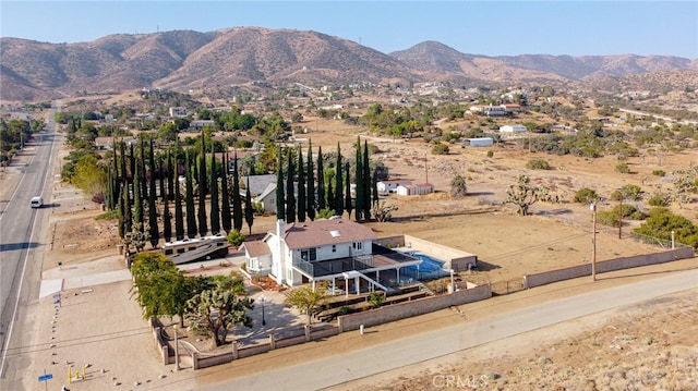 drone / aerial view featuring a mountain view