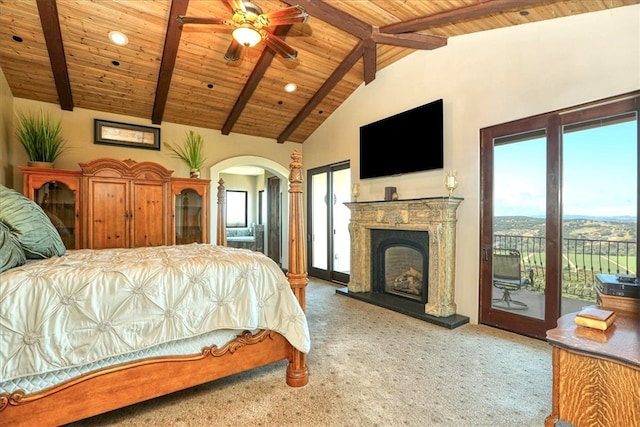 bedroom featuring carpet floors, access to exterior, wooden ceiling, and arched walkways