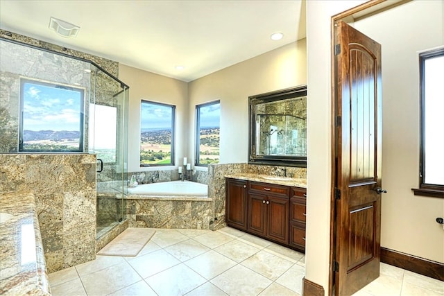 full bath with a stall shower, tile patterned floors, vanity, a garden tub, and visible vents