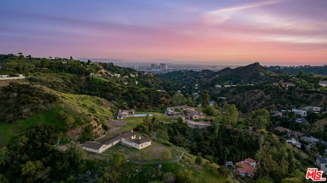 view of aerial view at dusk