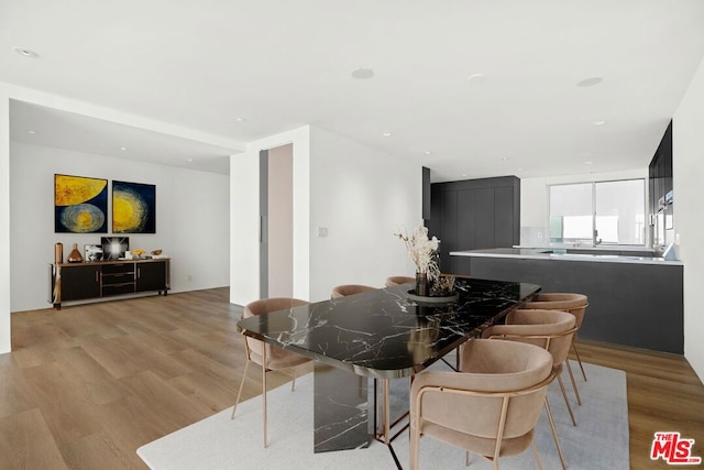 dining area featuring light hardwood / wood-style flooring