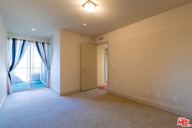 view of carpeted empty room