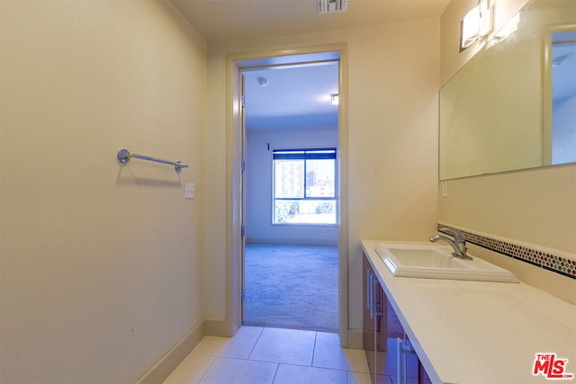 bathroom with vanity and tile patterned floors