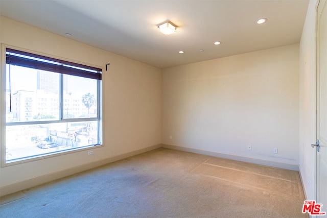 view of carpeted spare room