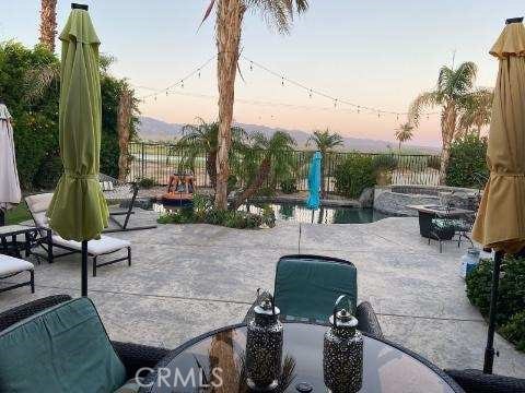 patio terrace at dusk with a fire pit